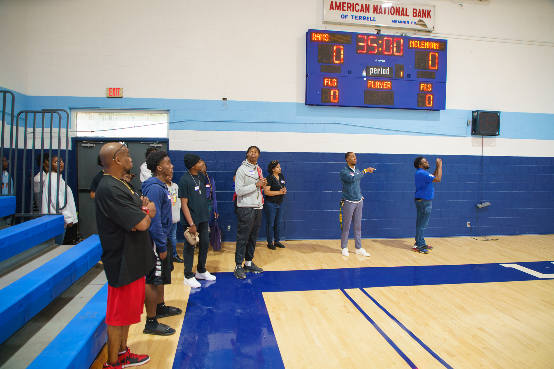 Community gathering in the campus gymnasium