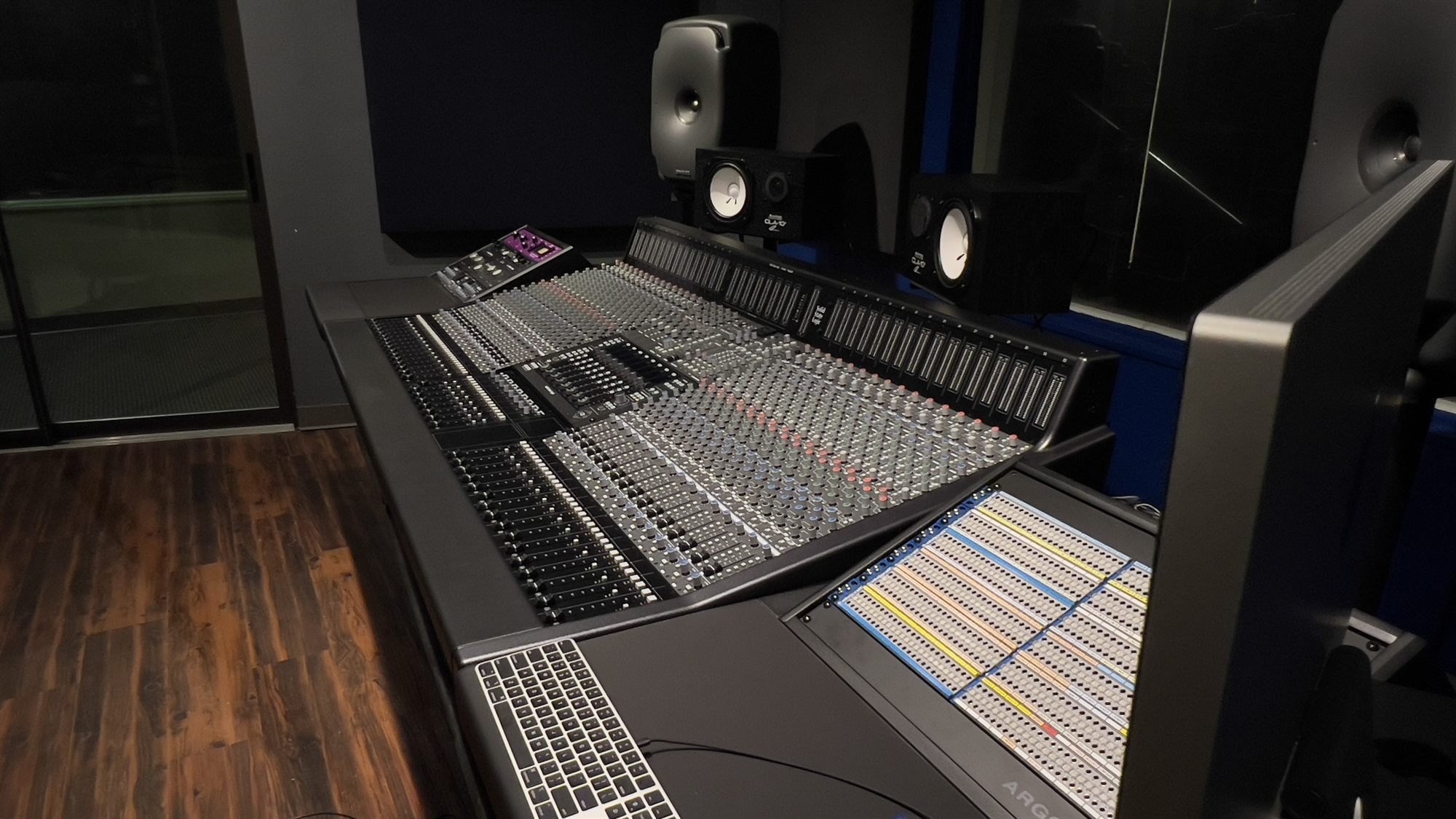 The SSL Origin 32 console and Genelec monitors in the Upper Room Studios control room